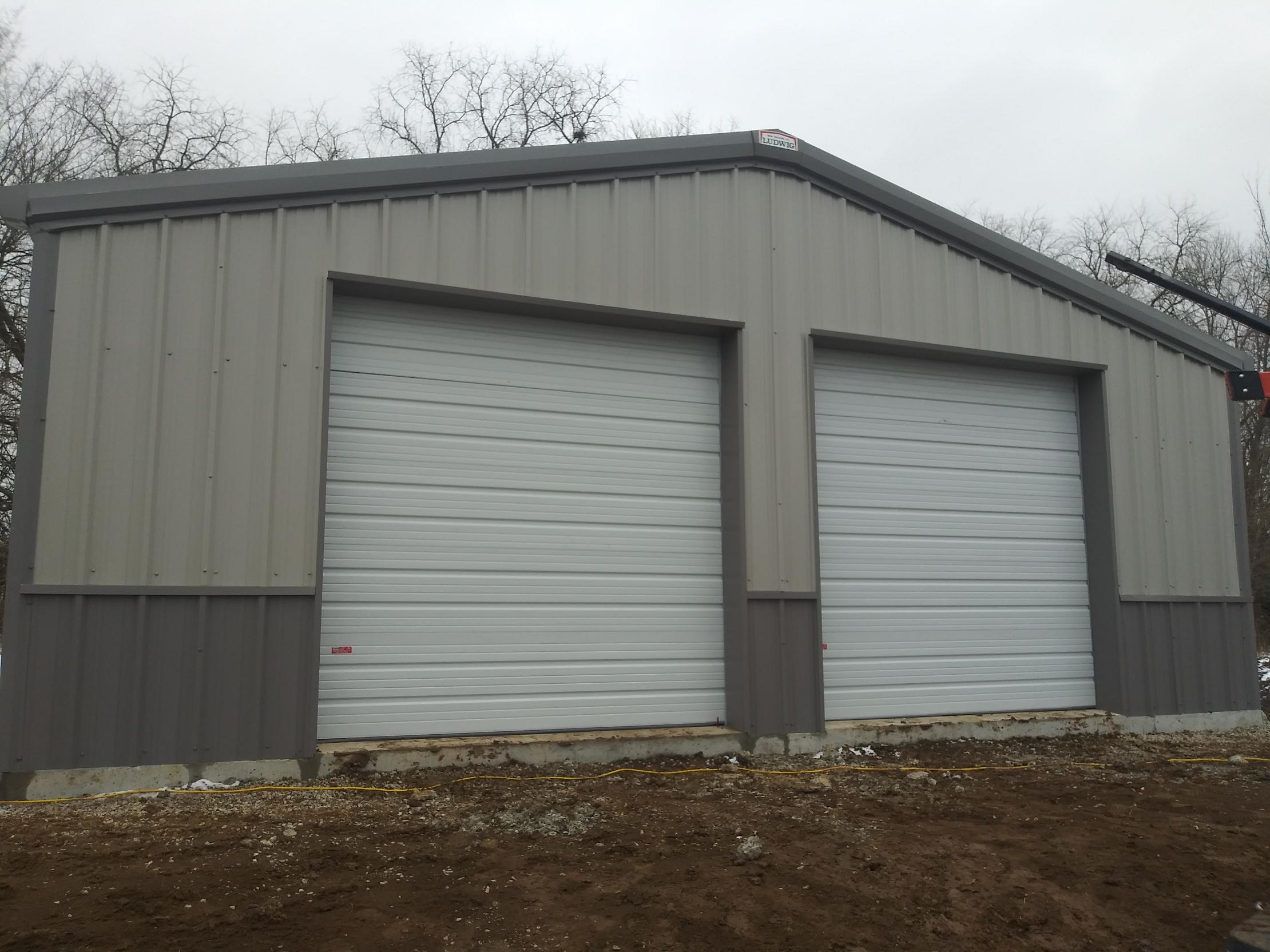 Commercial roll-up garage door installation in Greenwood, MO